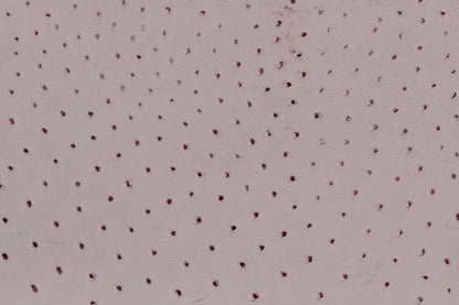 Lambskin embossed with ostrich texture in soft lavender, hand-stitched in Los Angeles