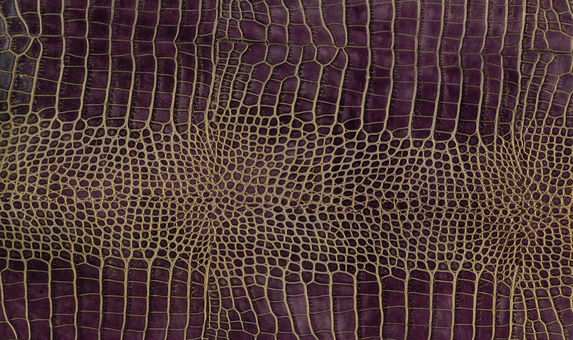 Italian hornback crocodile in iridescent purple and green, hand-stitched in LA